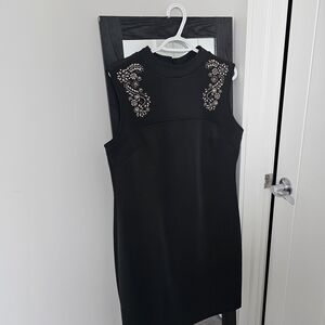 Elegant Black Mini Dress with Embellished Shoulders